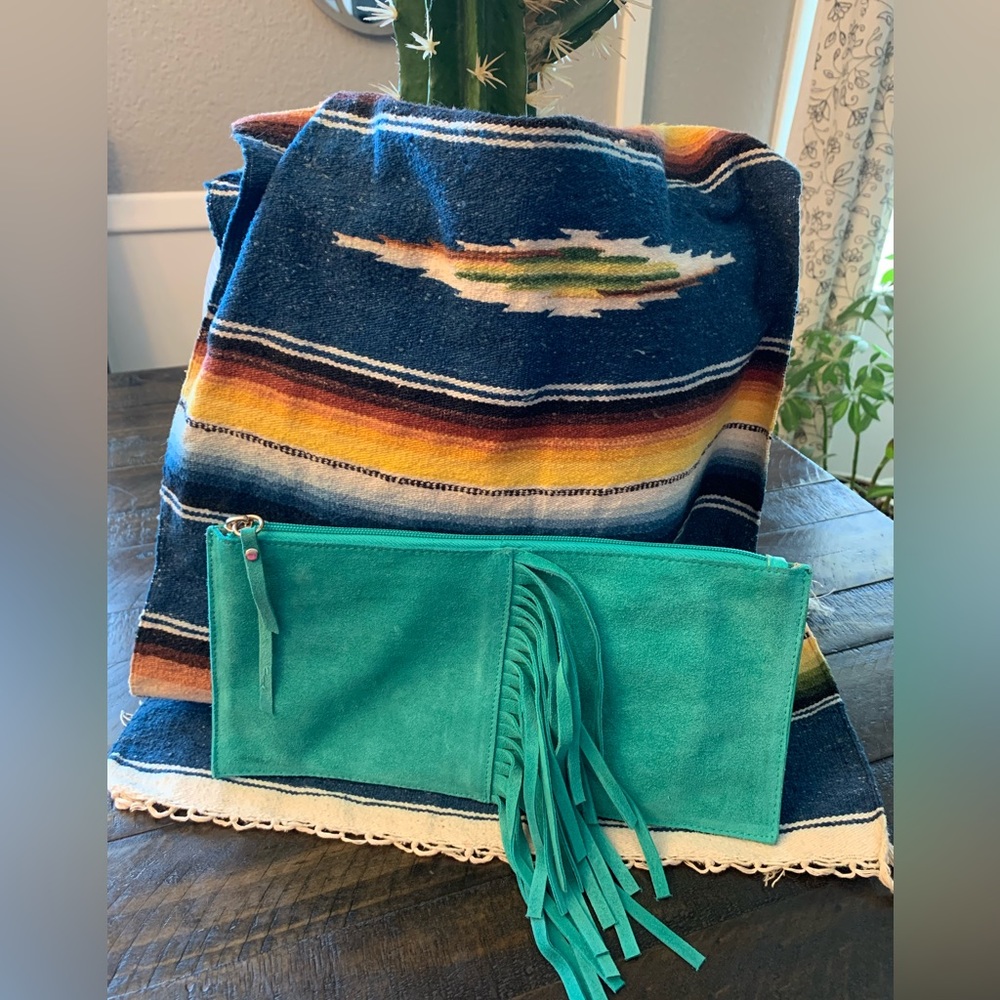 Turquoise hand clutch fringed